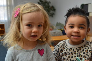 two girls smiling