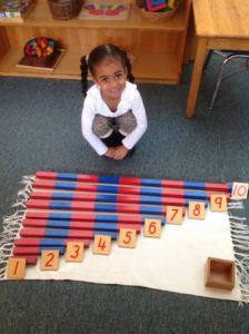 girl completing sensorial work