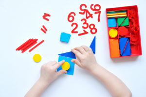 child playing with materials