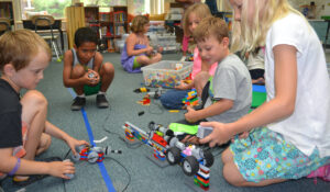 children playing with Lego Engineering