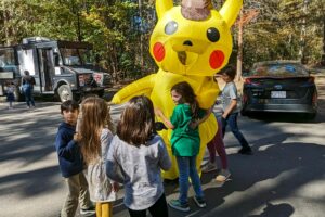 pikachu visiting children in the New School Fall Festival