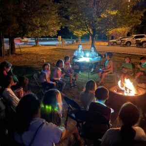 children and teachers at a science night out camping event