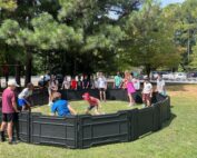 children playing in a gaga pit at The New School